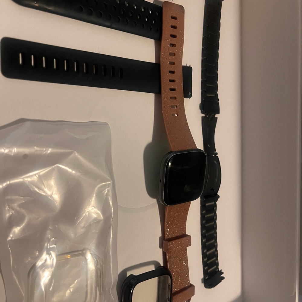 Fitbit Versa 2 with Black and pink Bands